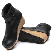 Load image into Gallery viewer, Black Birkenstock Women&#39;s Ebba Leather Ankle Wedge Bootie Side Zip Top Sole View
