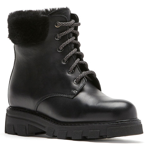 Black La Canadienne Women's Andy Waterproof Leather Winter Combat Boot With Genuine Shearling Collar And Lining Profile View