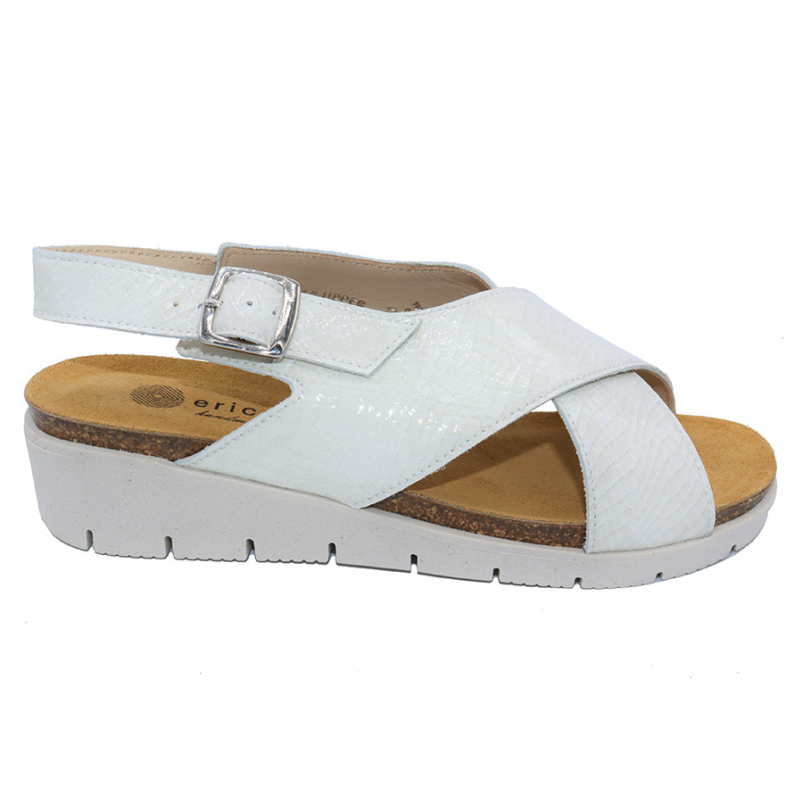 Ice White With Light Grey Sole Eric Michael Women's Cancun Snake Print Leather Cross Strap Ankle Strap Buckle Wedge Sandal