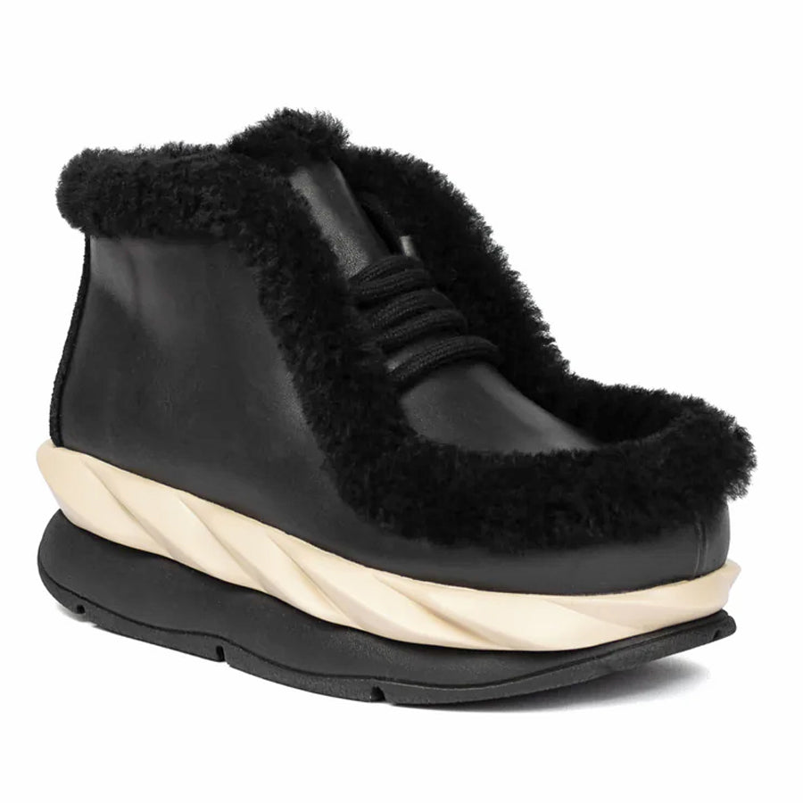 Black With Off White Midsole 4CCCCees Women's Leather With Shearling Accents Ankle Bootie Profile View