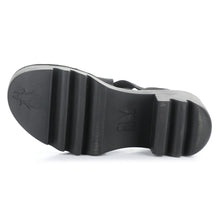 Load image into Gallery viewer, Black Women&#39;s Fly London Taji502Fly Leather And Elastic Strappy Heeled Sandal Sole View
