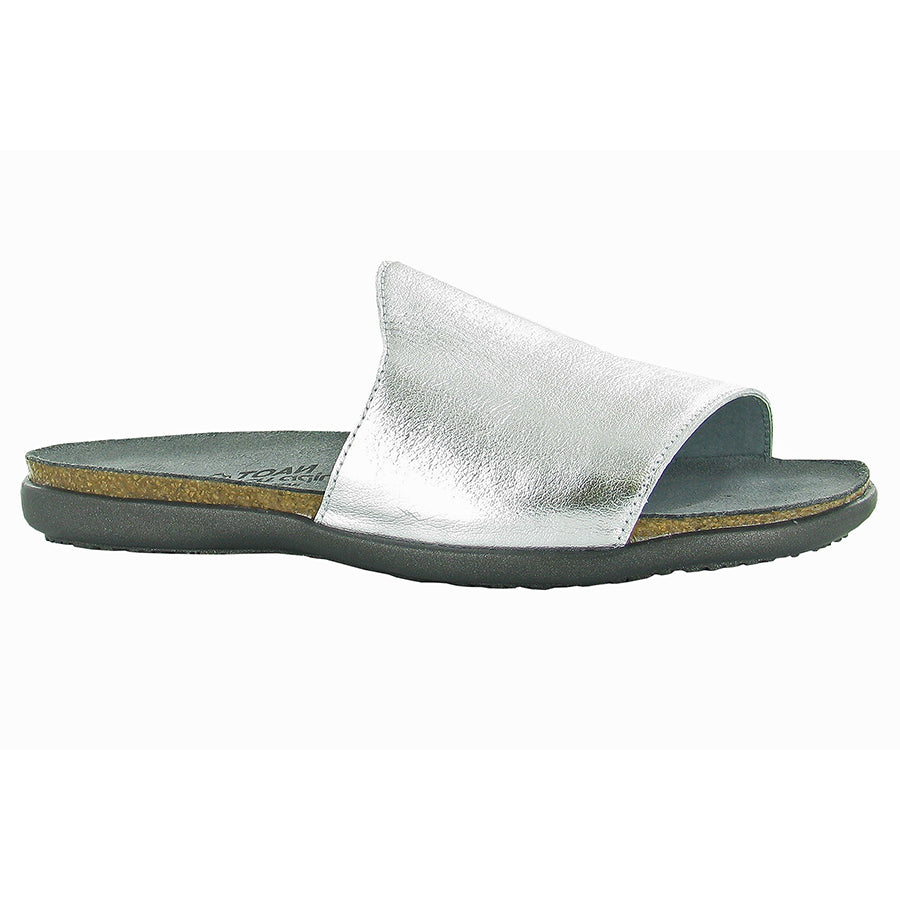 Soft Silver With Black Sole Naot Women's Skylar Metallic Leather Single Strap Slide Sandal
